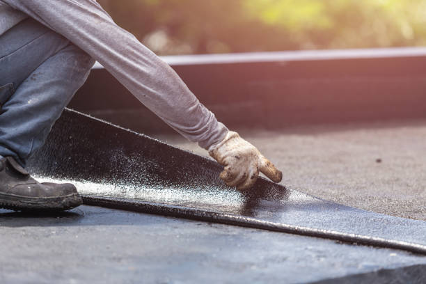 Professional Basement Waterproofing technician working in Linden, MI